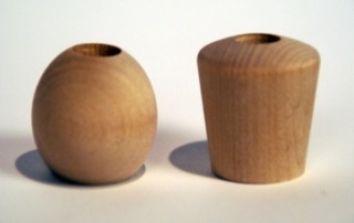 Unfinished wooden diffuser caps and balls, crafted for manufacturers and bulk production runs.